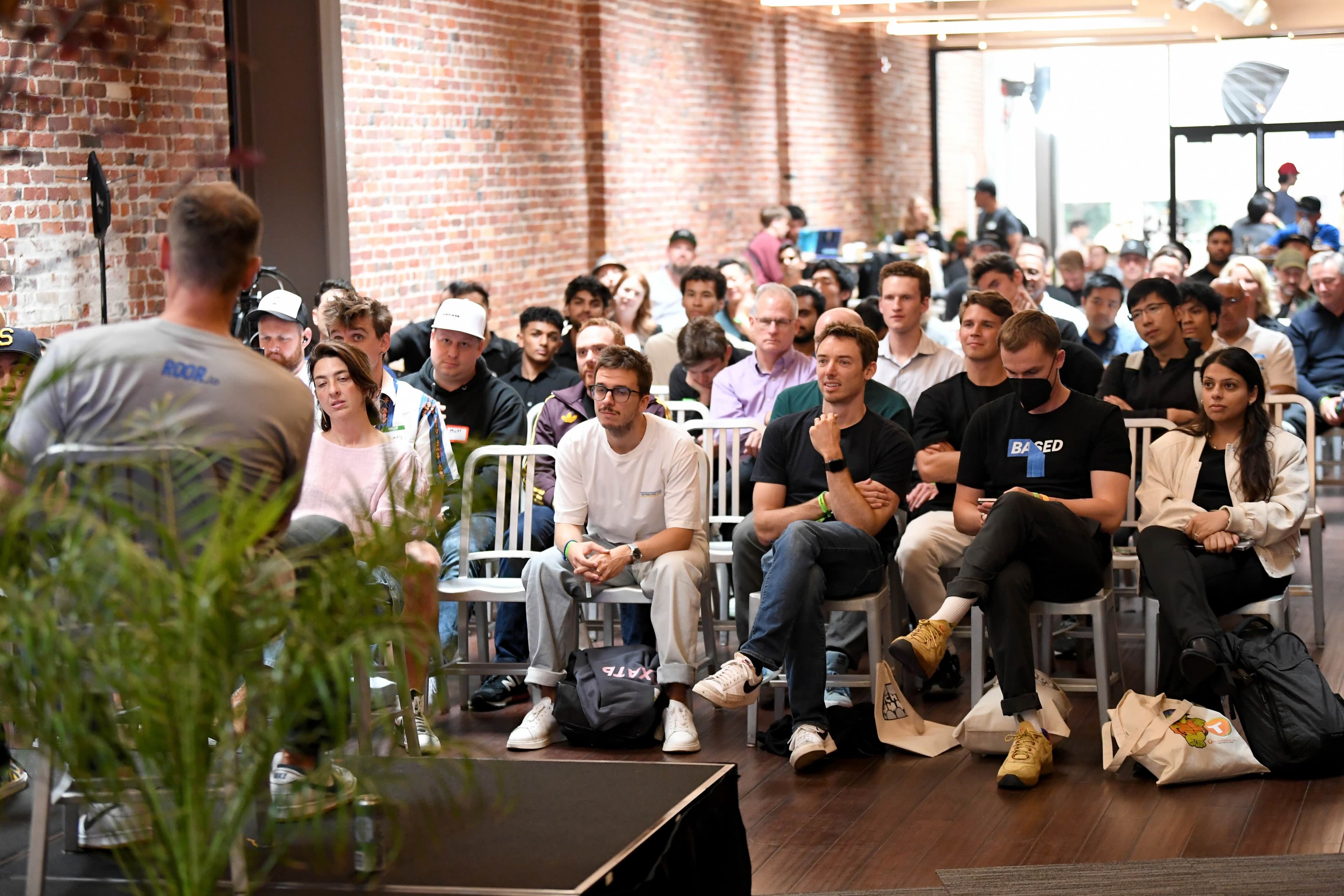 Local event producer speaking during a Dimes Gallery program